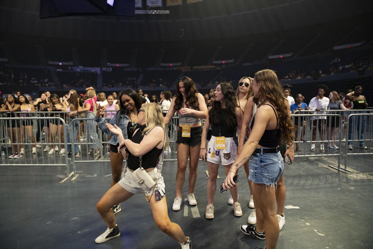 LSU sports administration graduate student and gymnast Sierra Ballard dances with other gymnasts Thursday, April 25, 2024, during LSU Student Government&#8217;s annual Groovin&#8217; concert at the Pete Maravich Assembly Center in Baton Rouge, La.