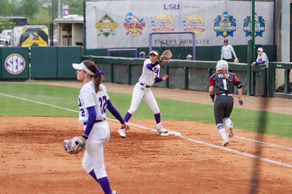 LSU softball graduate student utility Raeleen Gutierrez (55) catches the out Friday, April 26, 2024, during LSU's 2-1 loss against Arkansas at Tiger Park in Baton Rouge, La.