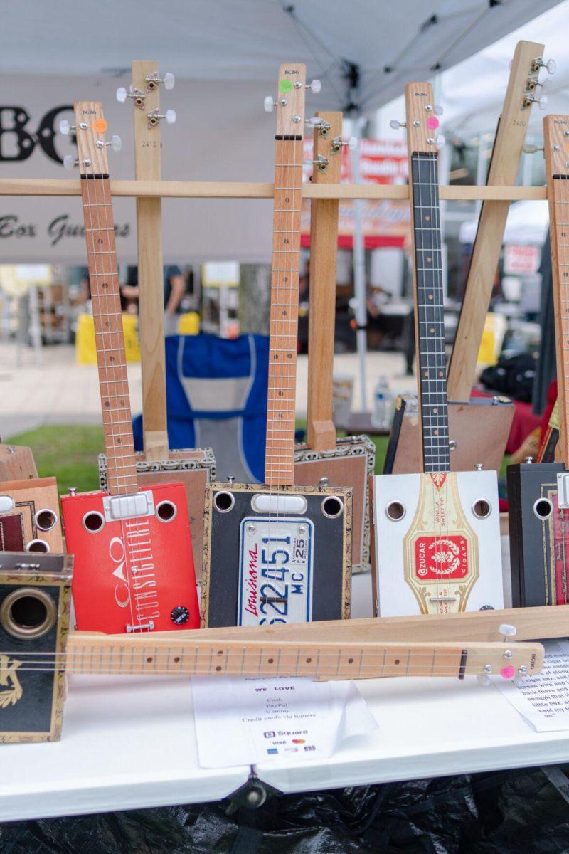 Cigar box guitars sit for sale Saturday, April 20, 2024, at the Baton Rouge Blues Festival.