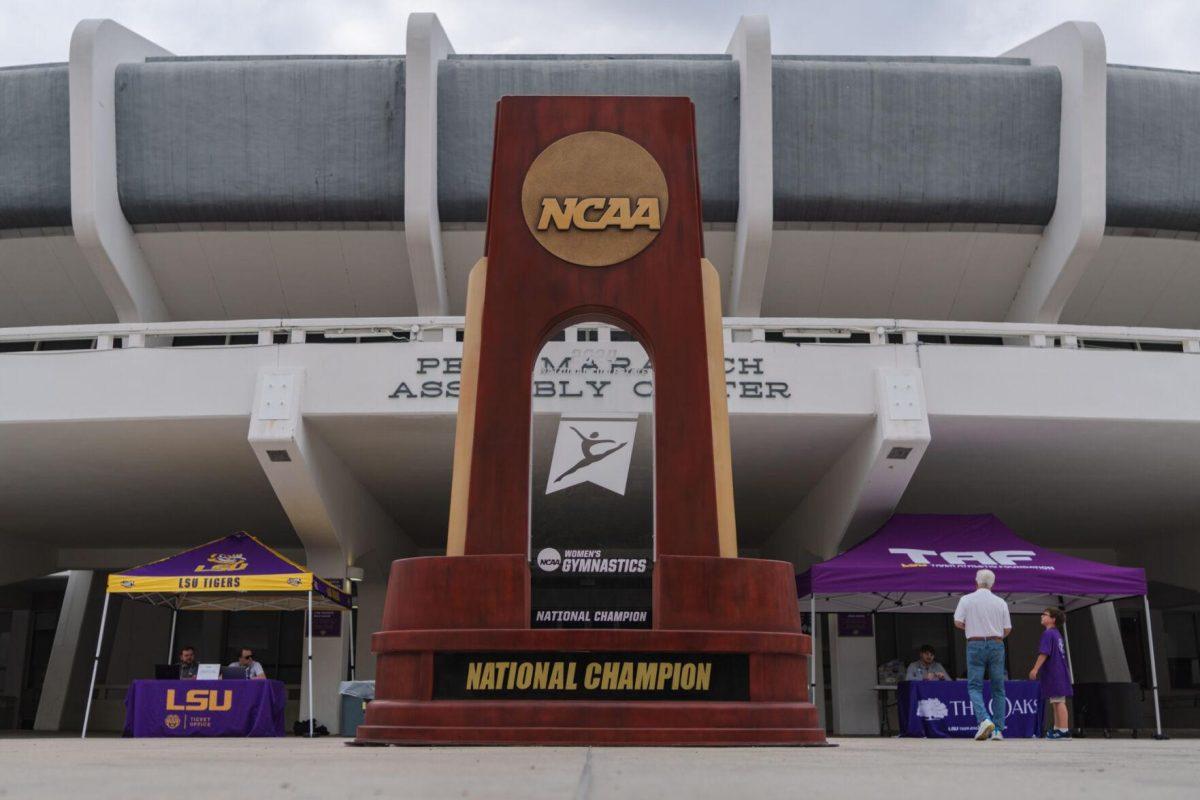 A giant trophy sits in front of the Pete Maravich Assembly Center Wednesday, April 24, 2024, at the LSU gymnastics championship parade on LSU's campus in Baton Rouge, La.