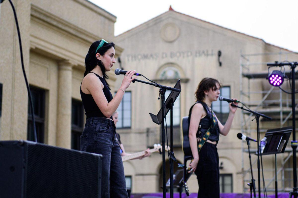 The band performs on Tuesday, April 16, 2024, in front of Memorial Tower in Baton Rouge, La.