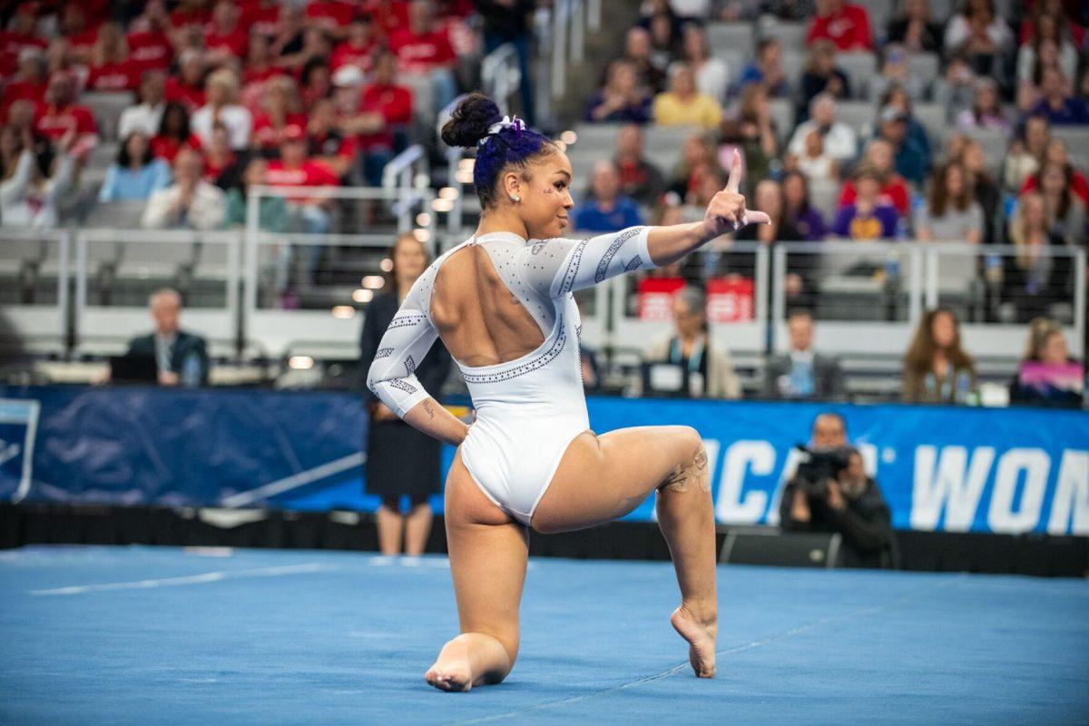 LSU gymnastics freshman all-around Konnor McClain holds up an L during her routine during the NCAA Gymnastics Championship on Saturday, April 20, 2024, in Fort Worth, Tx.