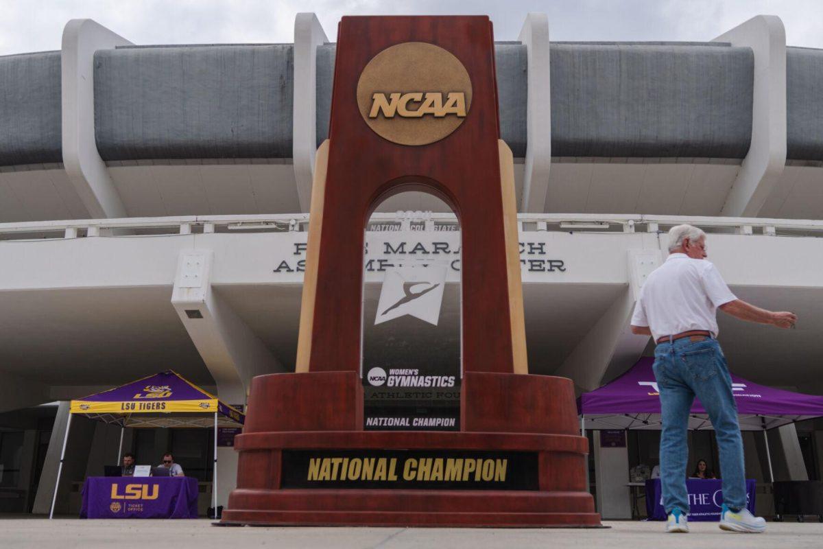 A giant trophy sits in front of the Pete Maravich Assembly Center Wednesday, April 24, 2024, at the LSU gymnastics championship parade on LSU's campus in Baton Rouge, La.