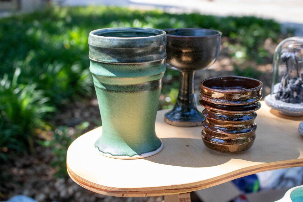 Pottery sits on the shelf on Wednesday, April 24, 2024, in Free Speech Alley on LSU's campus.