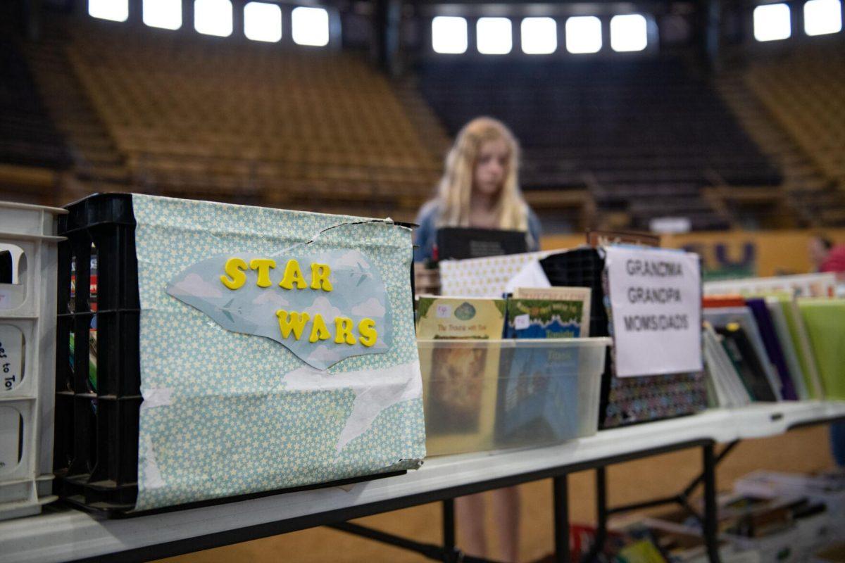 Decorated boxes hold children's books Sunday, April 14, 2024, during the Friends of the LSU Libraries Book Bazaar at the John M. Parker Agricultural Coliseum in Baton Rouge, La.