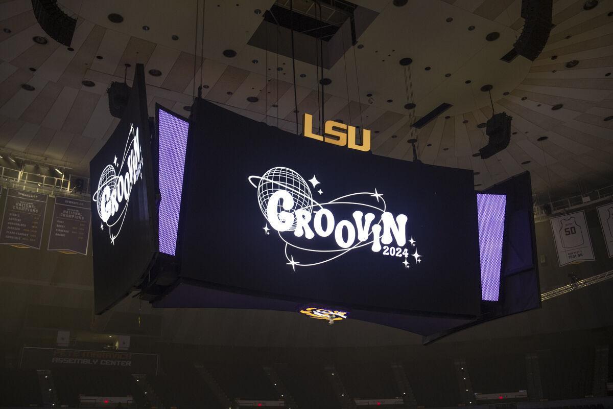 Screens with the Groovin' logo hang from the ceiling Thursday, April 25, 2024, before LSU Student Government&#8217;s annual Groovin&#8217; concert at the Pete Maravich Assembly Center in Baton Rouge, La.