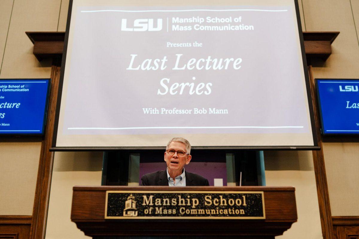 Professor Bob Mann speaks to the crowd Wednesday, April 17, 2024, at the Last Lecture Series in the Holliday Forum at LSU in Baton Rouge, La.