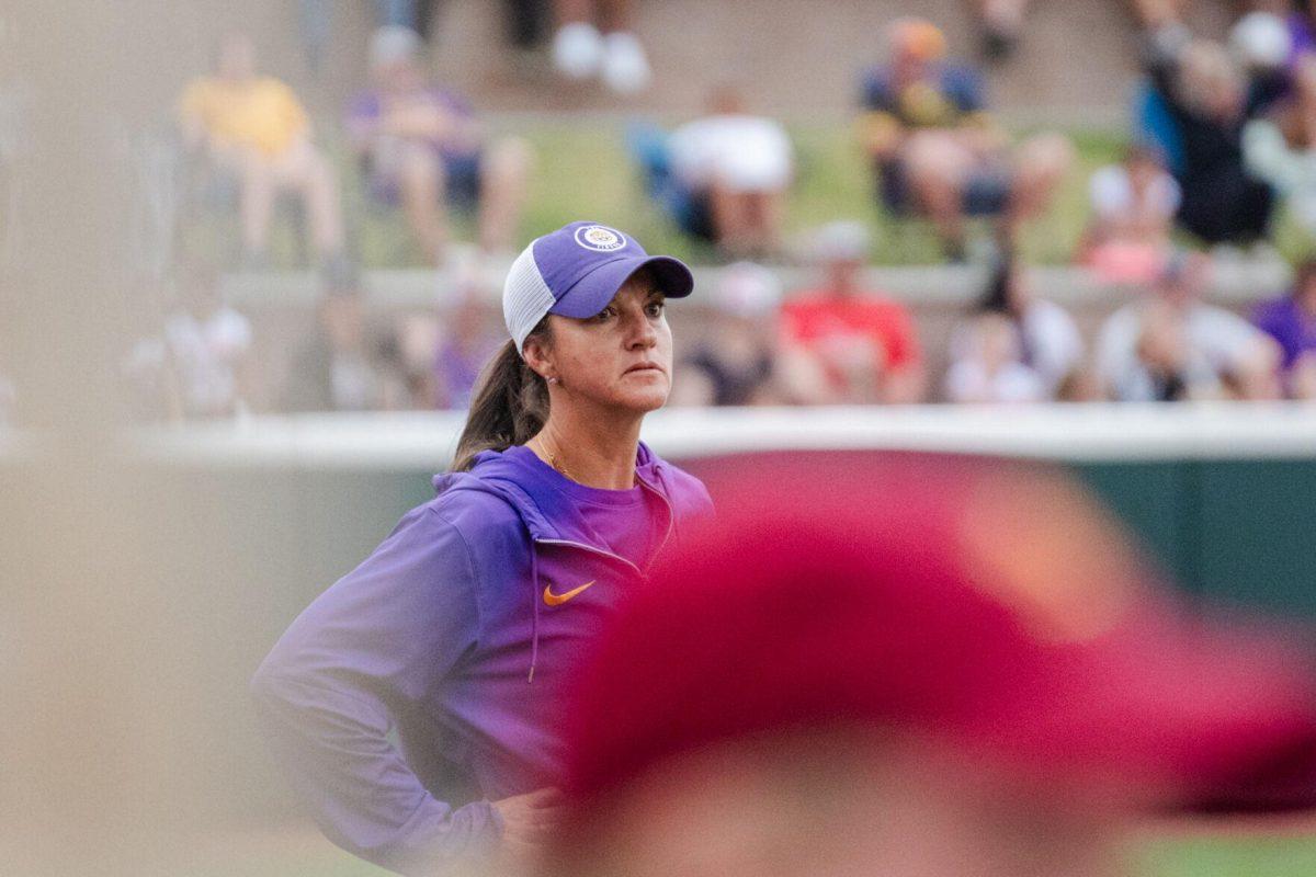 LSU softball head coach Beth Torina looks down the field Tuesday, April 2, 2024, during LSU's 7-4 win against ULM in Tiger Park in Baton Rouge, La.