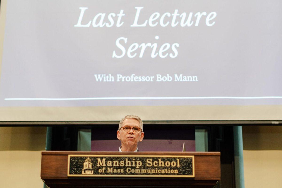 Professor Bob Mann speaks to the crowd Wednesday, April 17, 2024, at the Last Lecture Series in the Holliday Forum at LSU in Baton Rouge, La.