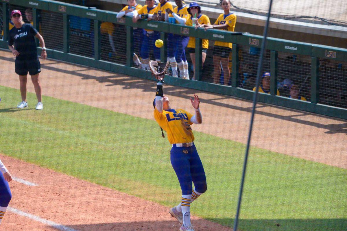 LSU softball graduate student infielder Raeleen Gutierrez (55) cathes the ball on Sunday, May 19, 2024,&#160;during LSU's&#160;9-0 win against Southern Illinois in the&#160;NCAA Regional Championship game at Tiger Park in Baton Rouge, La.