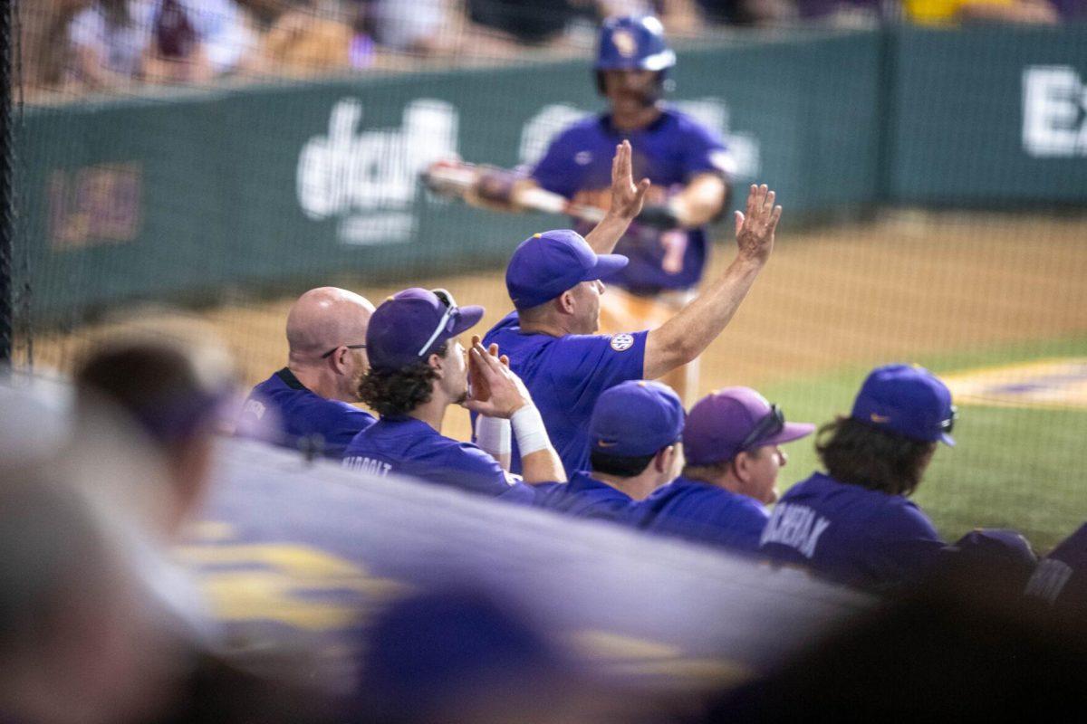 LSU head coach Jay Johnson throws up his hands during LSU's 6-4 win on Saturday, May 4, 2024, at Alex Box Stadium in Baton Rouge, La.