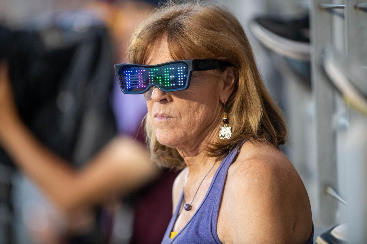 An LSU tiger fan wears light up glasses that read 'Geaux Tigers' during LSU's 6-4 win on Saturday, May 4, 2024, at Alex Box Stadium in Baton Rouge, La.