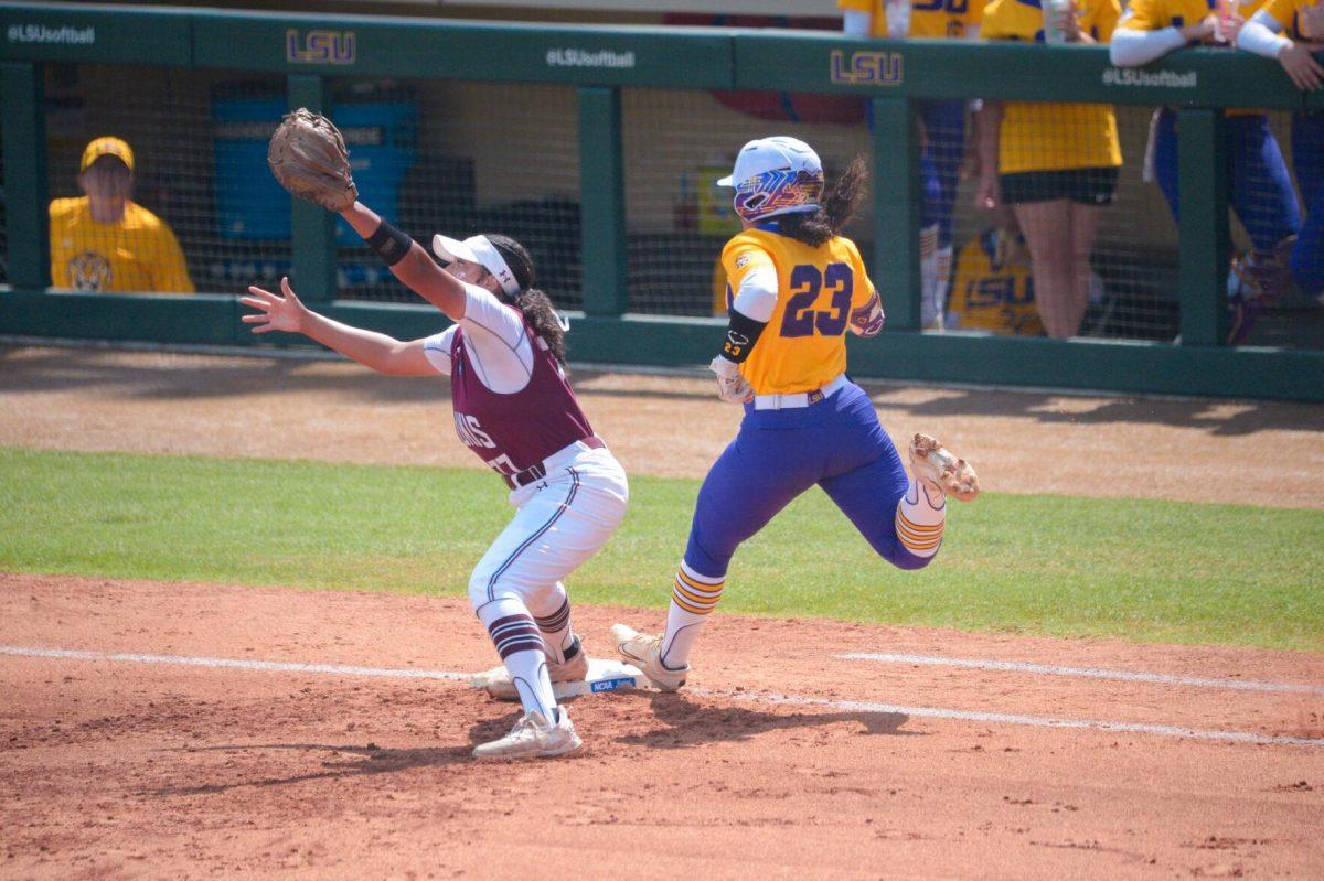 LSU softball freshman utility Sierra Daniel (23) runs to the base on Sunday, May 19, 2024, during LSU's&#160;9-0 win against Southern Illinois in the&#160;NCAA Regional Championship game at Tiger Park in Baton Rouge, La.