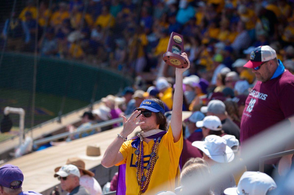 LSU fan celebrates on Sunday, May 19, 2024,&#160;during LSU's&#160;9-0 win against Southern Illinois in the&#160;NCAA Regional Championship game at Tiger Park in Baton Rouge, La.