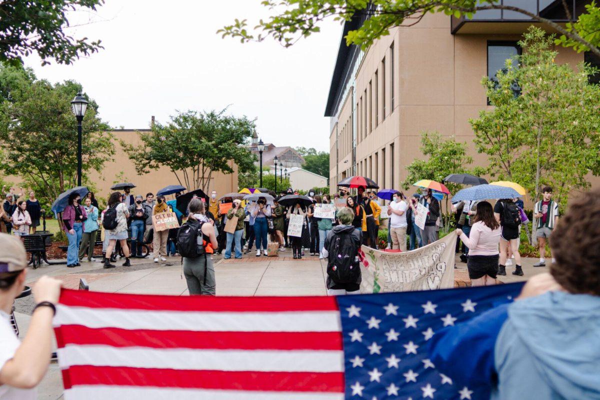 Protesters and counter-protesters gather Friday, May 3, 2024, outside of Patrick F. Taylor Hall on LSU's campus in Baton Rouge, La.