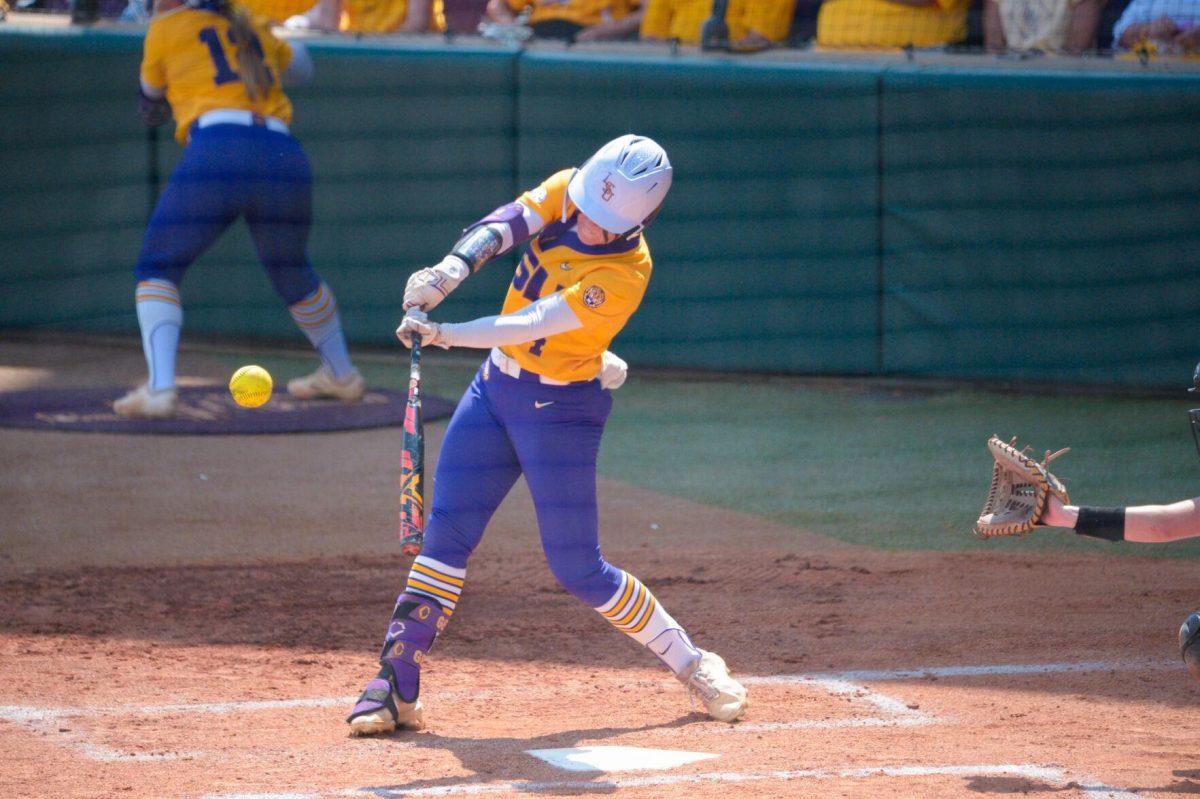 LSU softball junior outfield McKenzie Redoutey (4) hits the ball on Sunday, May 19, 2024,&#160;during LSU's&#160;9-0 win against Southern Illinois in the&#160;NCAA Regional Championship game at Tiger Park in Baton Rouge, La.