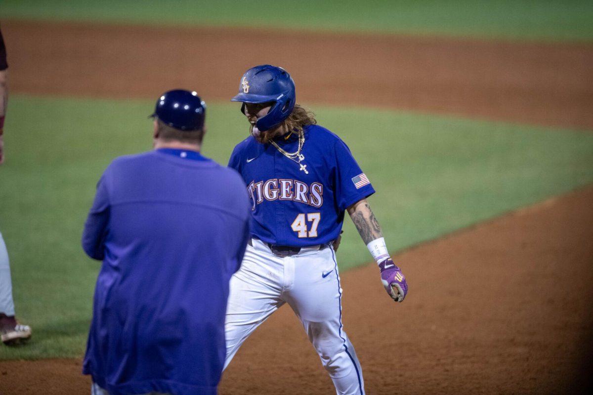 LSU baseball junior third basemen Tommy White (47) celebrates his base hit during LSU's 6-4 win on Saturday, May 4, 2024, at Alex Box Stadium in Baton Rouge, La.