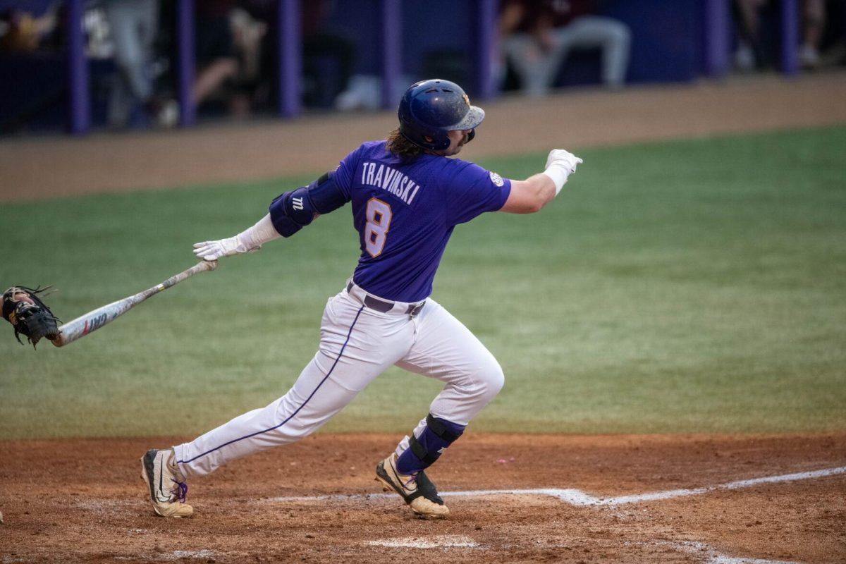 LSU baseball graduate student catcher Hayden Travinski (8) takes off for first base during LSU's 6-4 win on Saturday, May 4, 2024, at Alex Box Stadium in Baton Rouge, La.