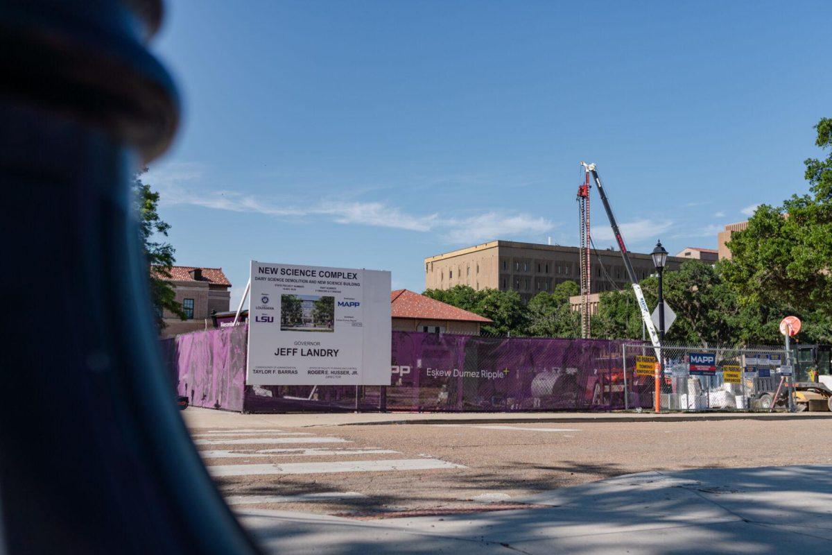 A sign indicates the construction site to be home to a new science complex Wednesday, May 15, 2024, on South Stadium Drive on LSU's campus in Baton Rouge, La.