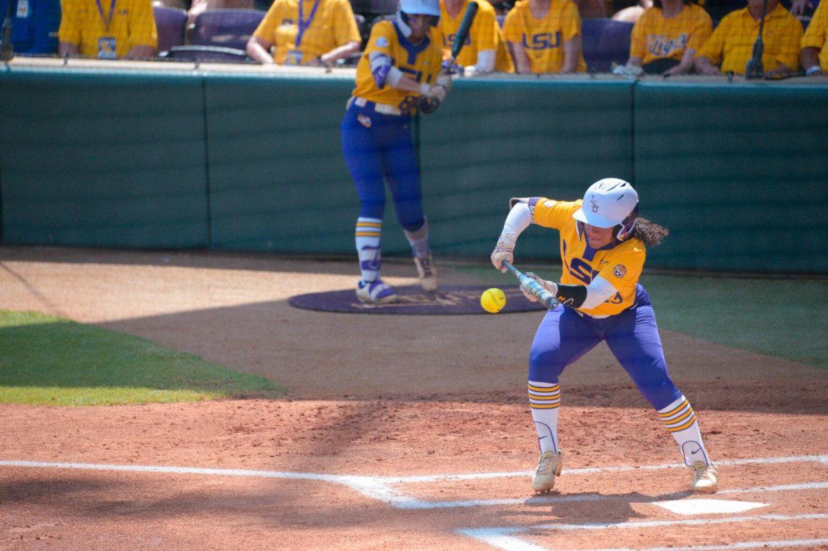 LSU softball freshman utility Sierra Daniel (23) bunts the ball on Sunday, May 19, 2024,&#160;during LSU's&#160;9-0 win against Southern Illinois in the&#160;NCAA Regional Championship game at Tiger Park in Baton Rouge, La.