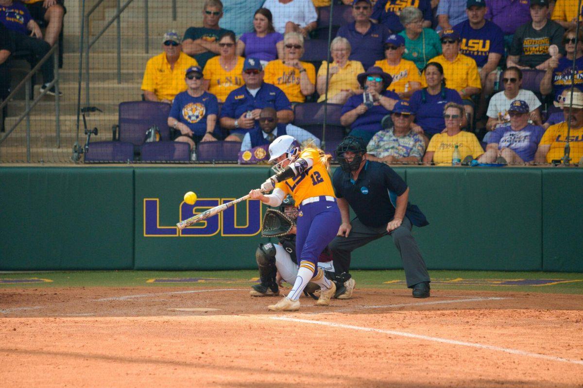 LSU softball sophomore infielder Maci Bergeron (12) hits the ball on Sunday, May 19, 2024,&#160;during LSU's&#160;9-0 win against Southern Illinois in the&#160;NCAA Regional Championship game at Tiger Park in Baton Rouge, La.