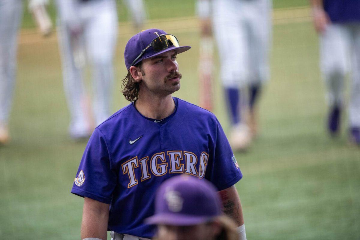 LSU baseball graduate student catcher Hayden Travinski (8) looks into the crowd before LSU's 6-4 win on Saturday, May 4, 2024, at Alex Box Stadium in Baton Rouge, La.