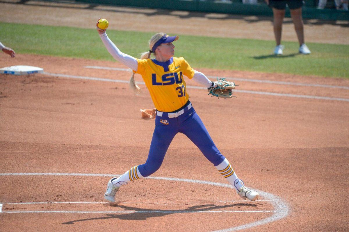 LSU softball graduate student utility Kelley Lynch (37) pitches the ball on Sunday, May 19, 2024, during the NCAA Regional Championship game 9-0 win against Southern Illinois University at Tiger Park in Baton Rouge, La.