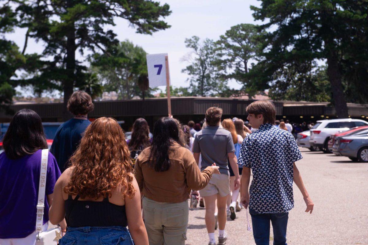 Incoming freshman students talking on their way to The 5 Dinning Hall Wednesday, June 12, 2024 Bengal Bound Orientation on LSU's campus in Baton Rouge, La.
