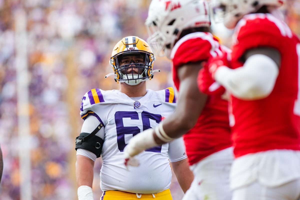 <p>LSU football freshman offensive lineman Will Campbell (66) looks towards the Ole Miss defensive line Saturday, Oct. 22, 2022 during LSU’s 45-20 win against Ole Miss at Tiger Stadium in Baton Rouge, La.</p>