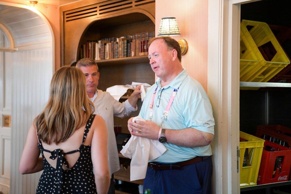 LSU mass communication Senior Emma Grace Lambert talks to Advocate sports reporter Scott Rabalais about her project at Sir Winston's in Paris, France on Thursday, August 1, 2024. Thursday, August 1, 2024.