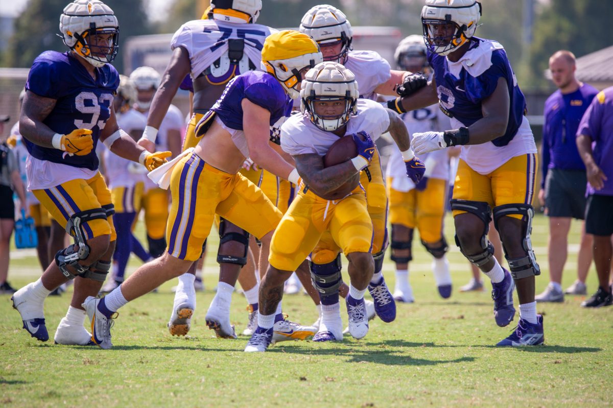 LSU football freshman running back Caden Durham (29) runs the ball during the LSU Fall Camp practice on Saturday, Aug. 17, 2024, in Baton Rouge.