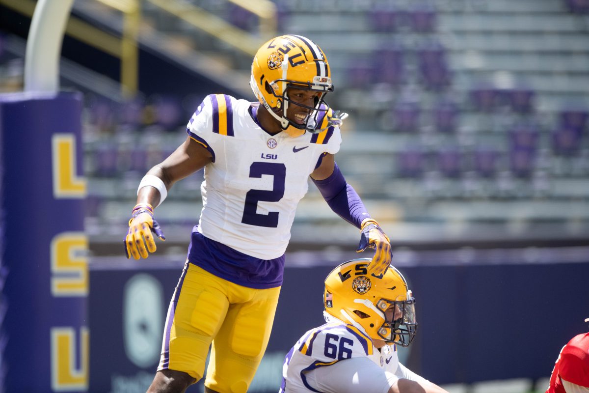 LSU football 5th-year senior wide receiver Kyren Lacy (2) plays duck duck goose with his teammates to celebrate making a touchdown during the LSU Spring Football game on Saturday, April 13, 2024, in Tiger Stadium.