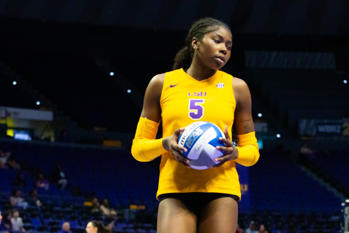 LSU volleyball outside hitter sophomore Jurnee Robinson (5) prepares to serve Saturday, Aug. 31, 2024, during LSU&#8217;s 2-3 loss to Troy in the Pete Maravich Assembly Center in Baton Rouge, La.