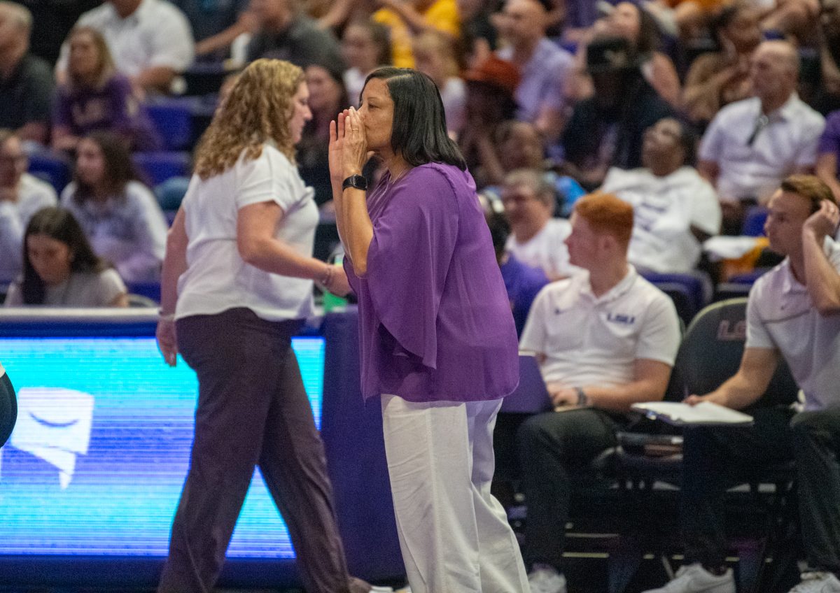 LSU volleyball head coach Tonya Johnson encourages the Tigers Sunday, Sept. 29, 2024, during LSU&#8217;s 3-0 loss against Texas in the Pete Maravich Assembly Center in Baton Rouge, La.