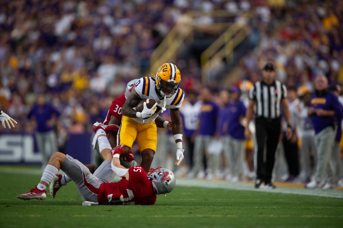 LSU football junior wide receiver Zavion Thomas (0) holds the ball on Saturday, Sept. 7, 2024, during LSU's 44-21 win against Nicholls at Tiger Stadium in Baton Rouge, La.