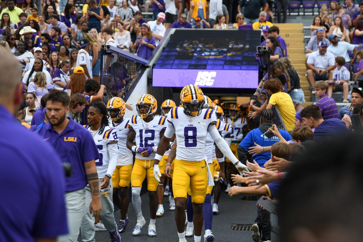 The LSU football team runs out onto the field on Saturday, Sept. 7, 2024, during LSU&#8217;s 44-21 win against Nicholls at Tiger Stadium in Baton Rouge, La.