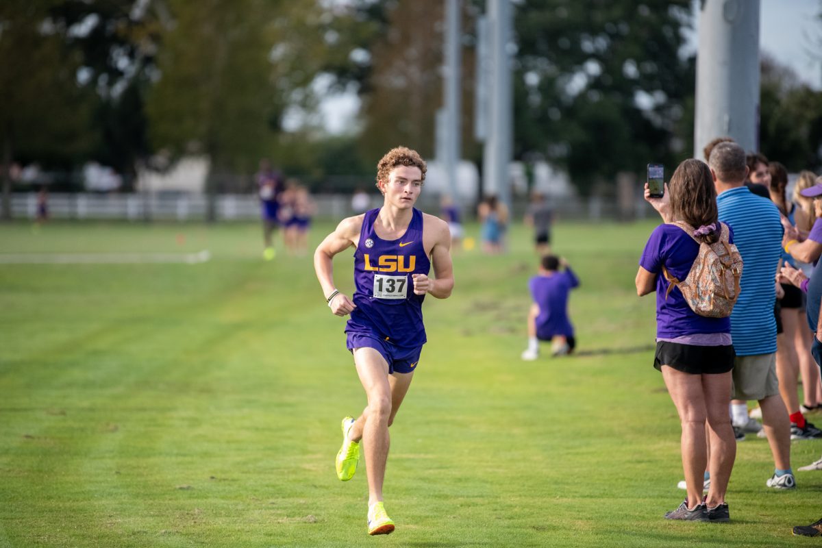 LSU men’s cross country sophomore runner Hugh Carlson runs the second leg of the 2x4K race on Friday, Sept. 13, 2024, during LSU’s 15-point win at the men’s LSU Cross Country Invitational at the LSU UREC Field Complex on Gourrier Avenue in Baton Rouge, La.