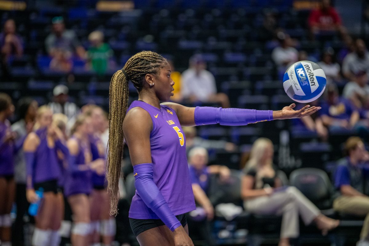 LSU volleyball outside hitter sophomore Jurnee Robinson (5) prepares to serve the ball Friday, Sept. 20, 2024, during LSU&#8217;s 3-0 loss to the San Diego in the Pete Maravich Assembly Center in Baton Rouge, La.