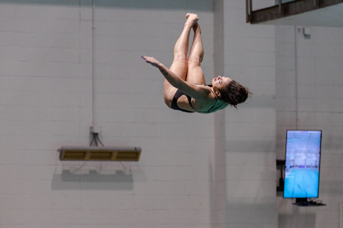 LSU diving junior Montserrat Gutierrez Lavenant twists in the air on Friday, Nov. 4, 2022, during LSU&#8217;s win over Alabama at the LSU natatorium in Baton Rouge, La.