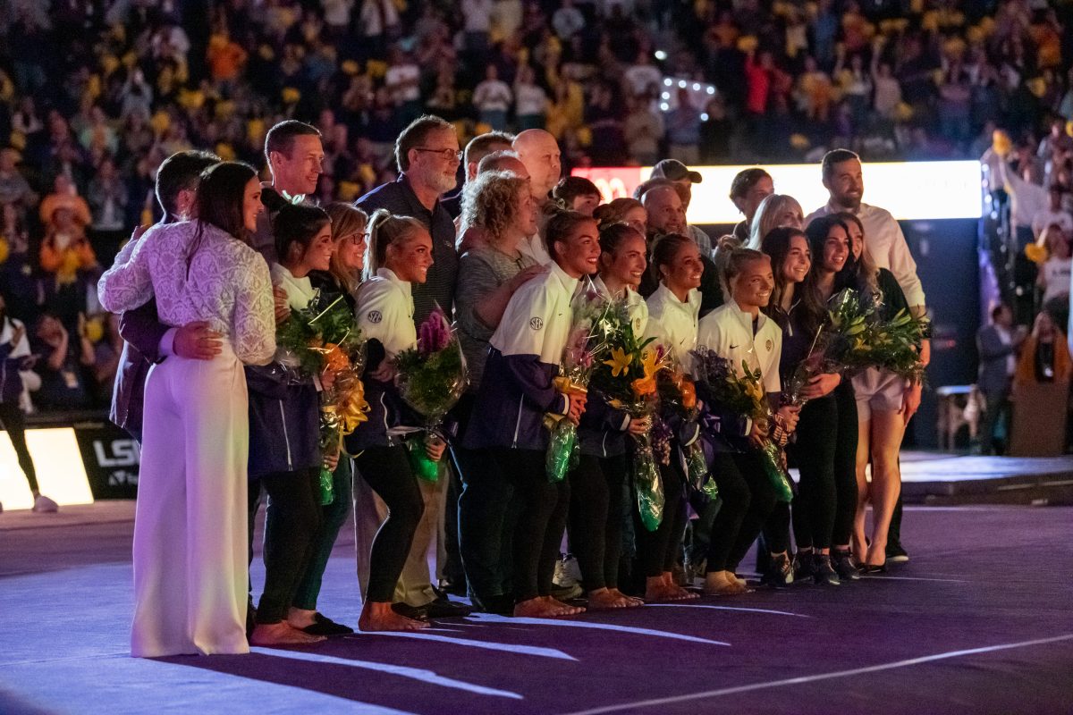 LSU gymanstics seniors pose with their family members Friday, March 11, 2022 before LSU's 198.125-197.875 win over University of Utah in the Pete Maravich Assembly Center on N. Stadium Drive in Baton Rouge, La.