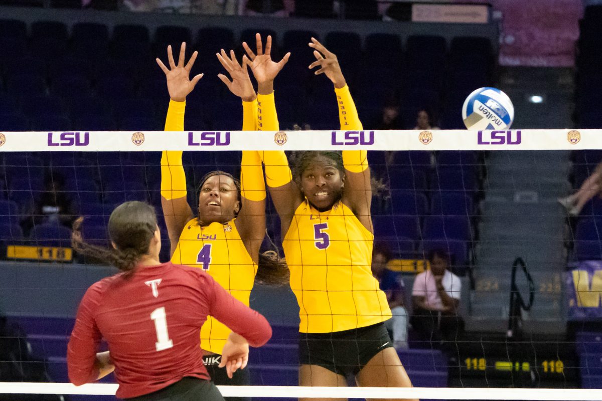 LSU volleyball middle blocker sophomore Angelina Lee (4) and outside hitter sophomore Jurnee Robinson (5) block Troy&#8217;s kill attempt Saturday, Aug. 31, 2024, during LSU&#8217;s 2-3 loss to Troy in the Pete Maravich Assembly Center in Baton Rouge, La.