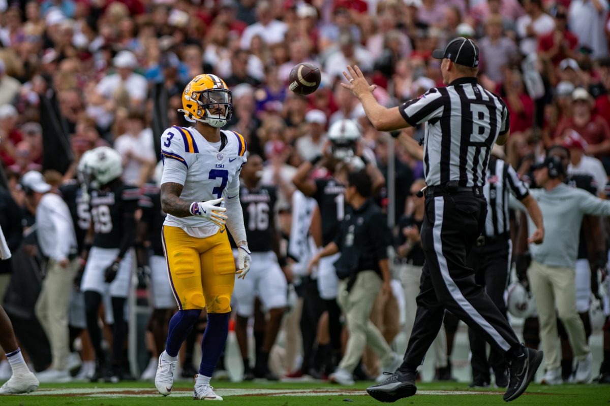 LSU football safety redshirt junior Sage Ryan (3) tosses the ball to a referee Saturday, Sept. 14th, 2024, during LSU&#8217;s 36-33 win over South Carolina at Williams-Brice Stadium in Columbia, Sc.