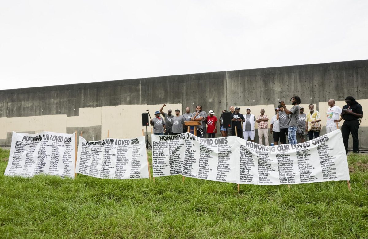 People gather at the Industrial Canal for the 19th annual community commemoration of Hurricane Katrina in New Orleans, Saturday, Aug. 31, 2024