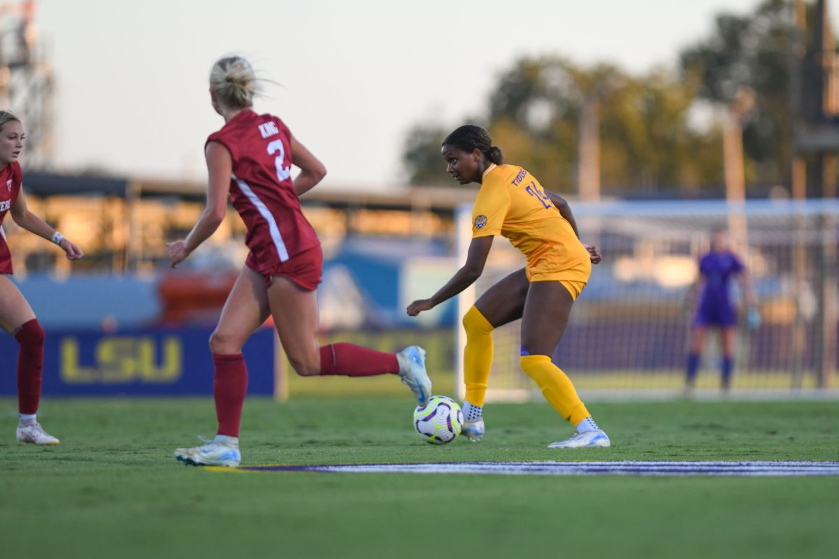 LSU soccer player Freshman Forward Aurora Gaines (24) kicks the ball on Sept. 26, 2024, during a women's soccer 3-1 win against Oklahoma at the LSU Soccer Stadium in Baton Rouge, La.