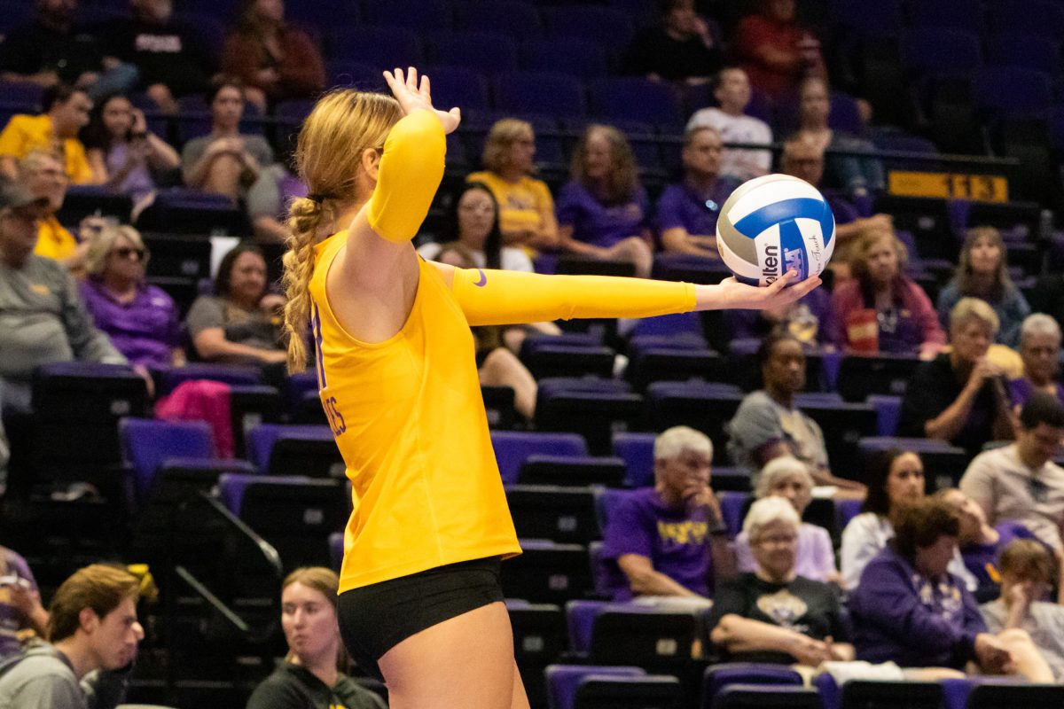 LSU volleyball outside hitter freshman Lainee Pyles (11) prepares to serve Saturday, Aug. 31, 2024, during LSU&#8217;s 2-3 loss to Troy in the Pete Maravich Assembly Center in Baton Rouge, La.