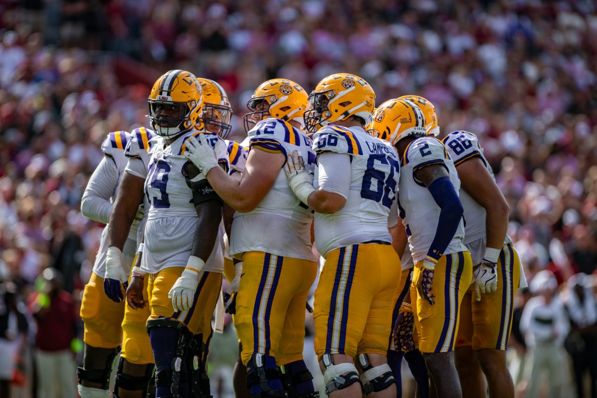 LSU football offensive line huddles together before lining up Saturday, Sept. 14th, 2024, during LSU&#8217;s 36-33 win over South Carolina at Williams-Brice Stadium in Columbia, Sc.