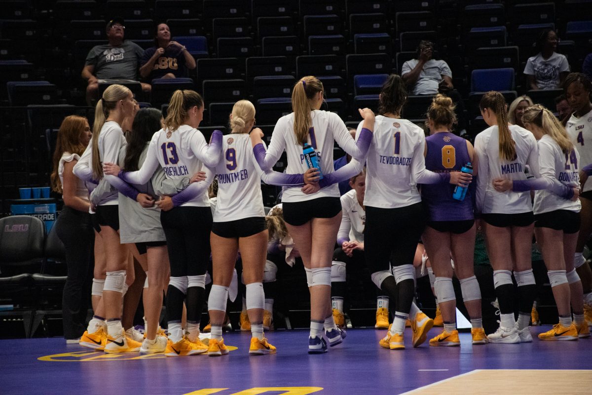 The LSU volleyball team uses a time-out to strategize on Thursday, Sept. 19, 2024, during LSU's 3-1 win against Boston College in the Pete Maravich Assembly Center in Baton Rouge, La.