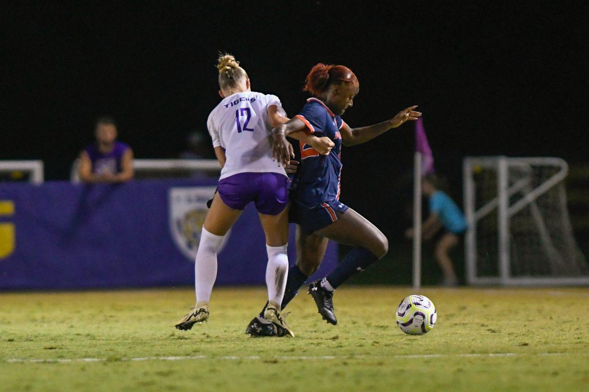 LSU soccer junior defender Sydney Cheesman (12) attempts to take possesion of the ball on Oct. 4, 2024, during LSU soccer's 4-0 loss to Auburn at the LSU Soccer Stadium in Baton Rouge, La.