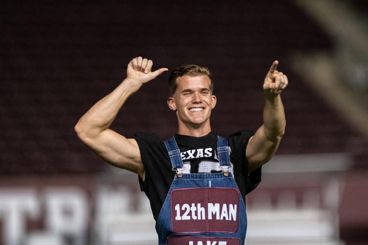 Midnight Yell leader Jake Carter pointing at the crowd on Oct. 26, 2024 at Kyle Field in College Station, Texas.