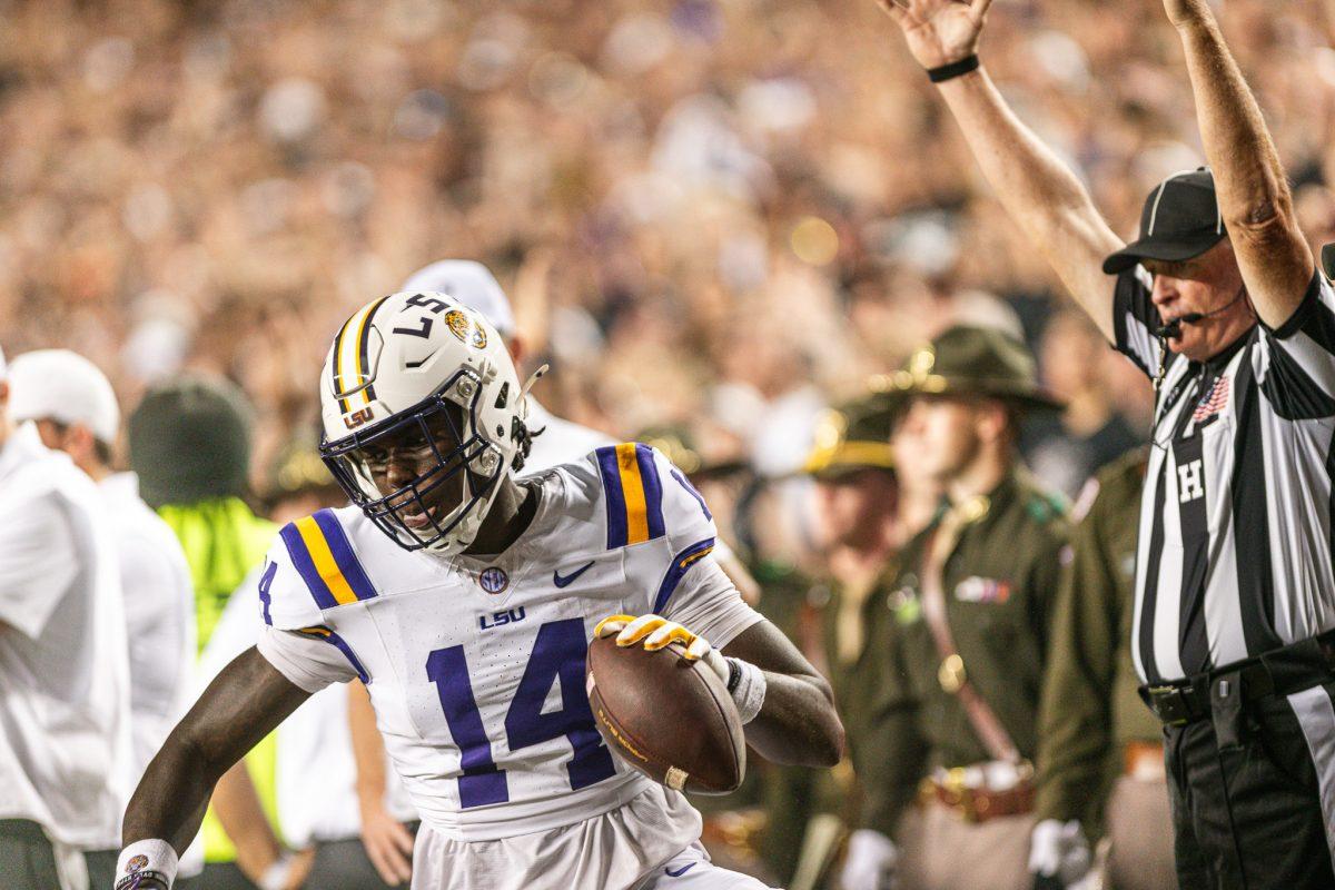 Freshman tight end Trey'Dez Green (14) scores a touchdown that does not stand after video review&#160;on Saturday, Oct. 26, 2024, during LSU's 23-38 loss against Texas A&amp;M at Kyle Field in College Station, Texas.&#160;